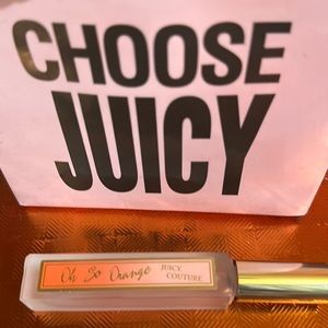 Small size bottle by juicy couture with small bag